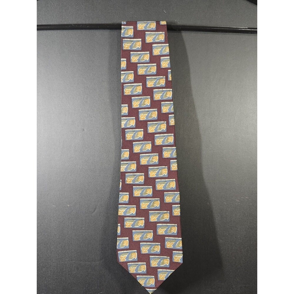 Chaps Ralph Lauren tie features a blue and gold leaf pattern on a dark red...